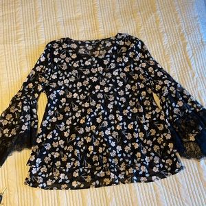 Very stretchy.  Black lace at bottom of arms